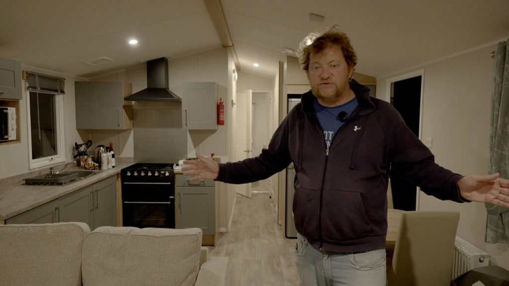 Hairy Traveller discovering his bungalow